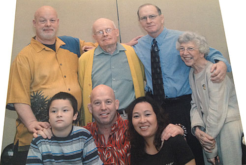 Pictured in photo: Top row, L to R, Sean Furey, James Furey (Dad), Dan Gable, Kathleen Furey; Bottom row, L to R, Frank Furey, Matt Furey, Zhannie Furey